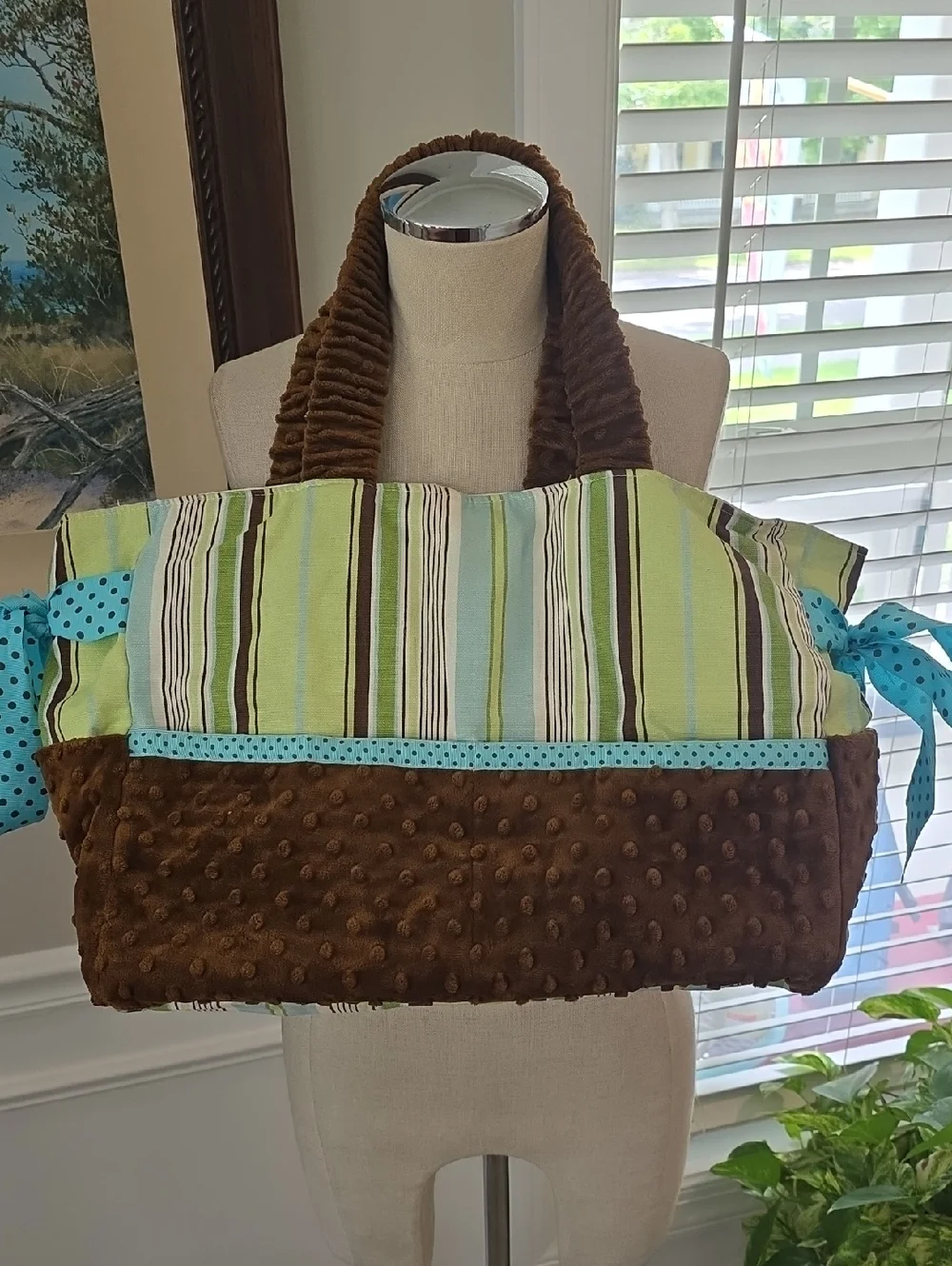 Striped Green and Brown Baby Bag with Blue Accents